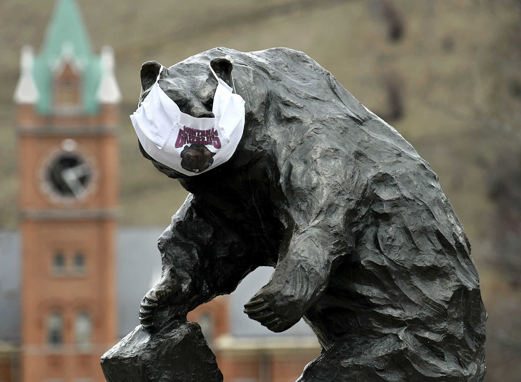 Face mask on UM griz statue